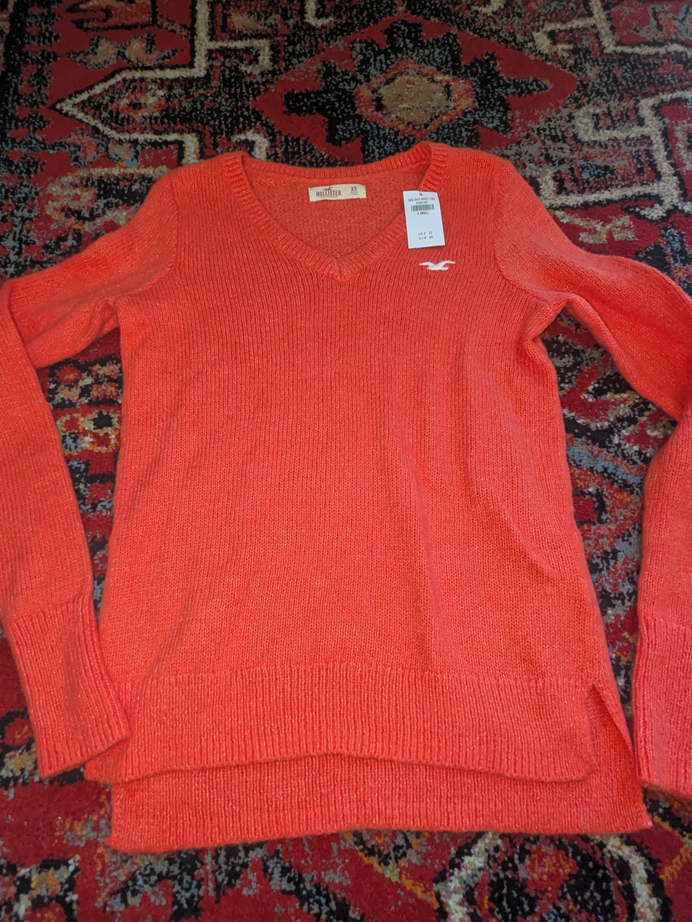 Hollister Women's V-Neck Sweater in Bright Coral